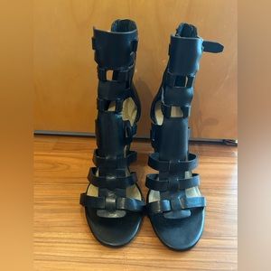 black leather gladiator heels